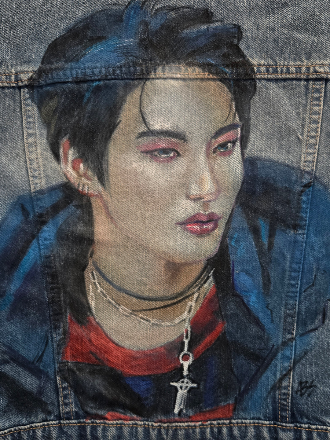 Detailed airbrush of Seonghwa’s portrait on custom ATEEZ denim jacket